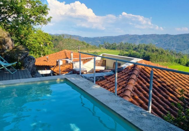 Swimming pool overlooking the mountains in accommodation in Gerês Pool Holiday Home Mountain Nature